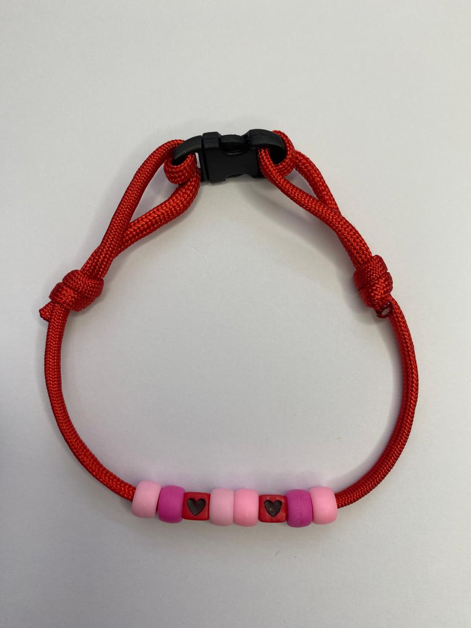 collar cordon ajustable detalles rosado y fucsia